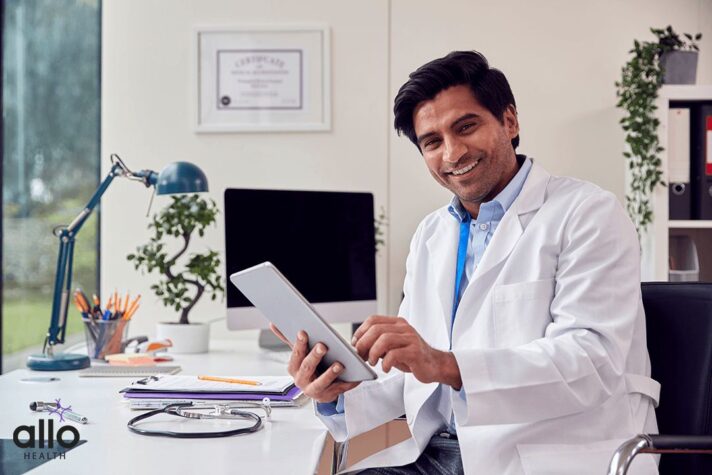 Doctor sitting and explaining about diagnosis of Erectile Dysfunction