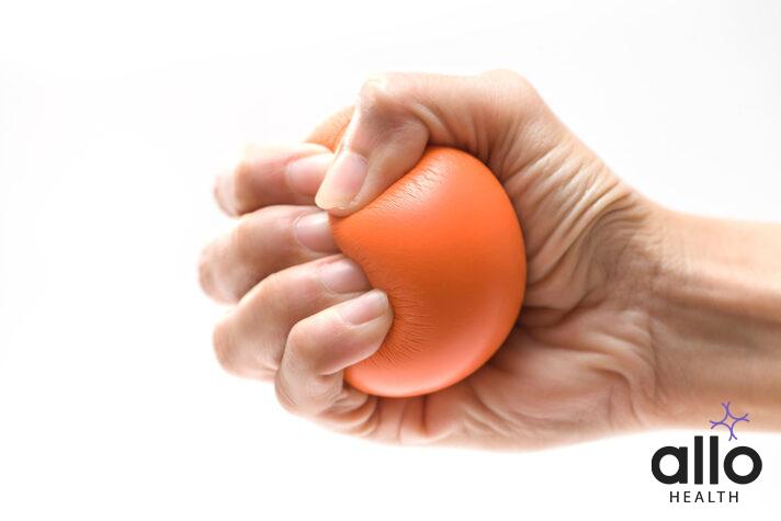 Hand squeezing a stress ball. squeeze technique for premature ejaculation, oats and erectile dysfunction