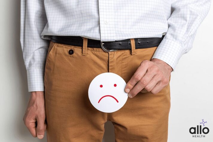 man standing with sad emoji due to Premature Ejaculation
