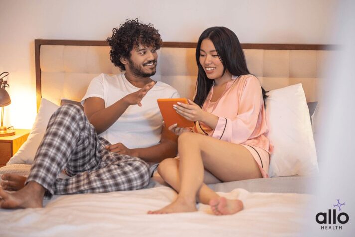 couple checking for the techniques to prevent premature ejaculation