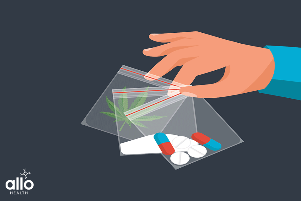 Drug Trade. Drug deal. The dealer holds the dose in package. Tablets, cocaine and marijuana. Abuse and addiction.