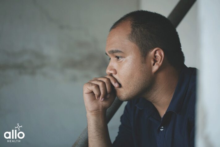 man thinking about the Delayed Ejaculation Causes