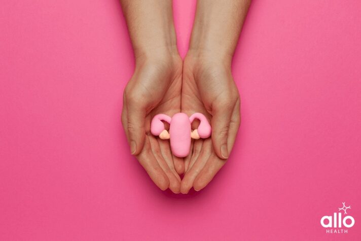 women holding a toy in the shape of ovaries - Vaginismus. vaginismus meaning in hindi