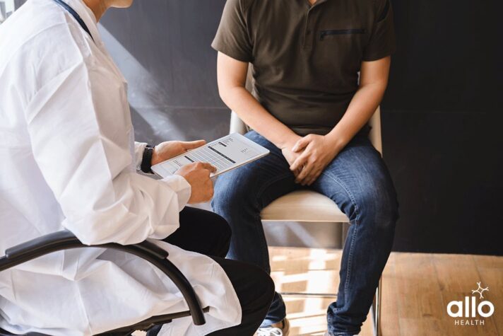 doctor explaining to patient about the Testicular Self-Examination
