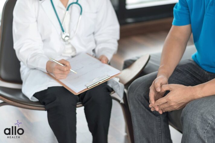 Doctor treating a patient with paraphimosis