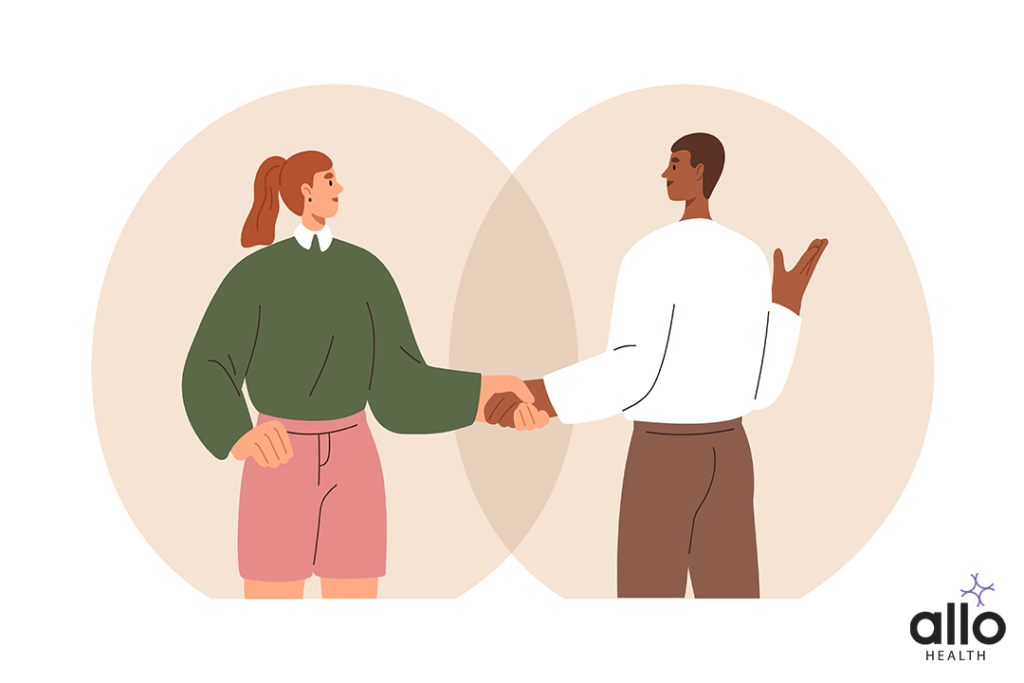 male and female handshaking each other