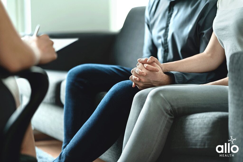 Anejaculation Diagnosis 1 doctor explaining to couple about the Different Methods And Tools Used In Diagnosis
