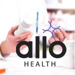 Pharmacist in pharmacy. Holding two bottles of pills and medicine. Professional druggist comparing medication. Man in white coat with tablets in drug store. Medical comparison or choice.
