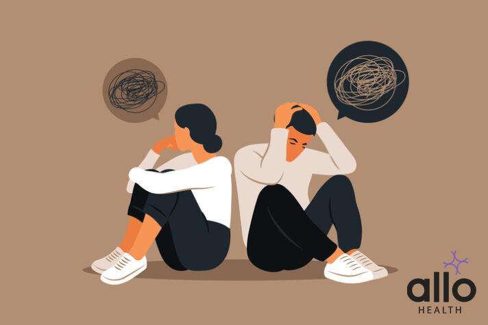 Man and a woman in a quarrel. Conflicts between husband and wife. Two characters sitting back to back, disagreement, relationship troubles.
