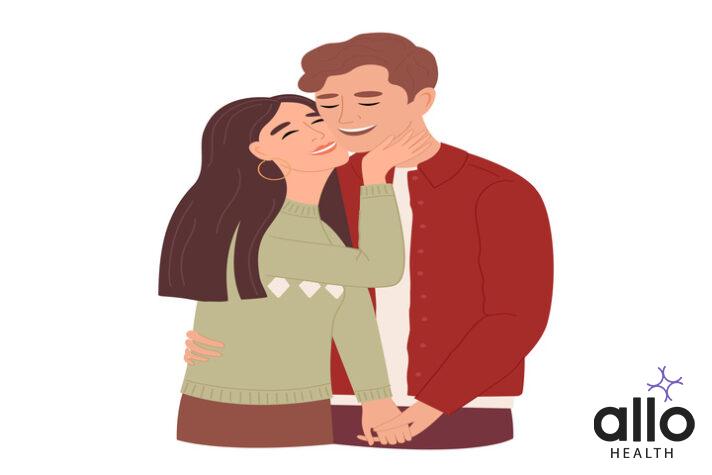 Pair of man and woman in love. Cute young couple hugging or cuddling.