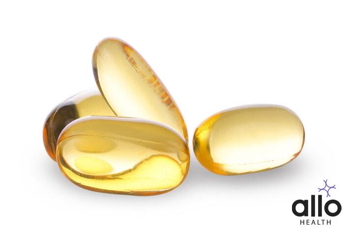 Close up of food supplement oil filled capsules suitable for: fish oil, omega 3, omega 6, omega 9, evening primrose, borage oil, flax seeds oil, vitamin A, vitamin D, vitamin D3, vitamin E