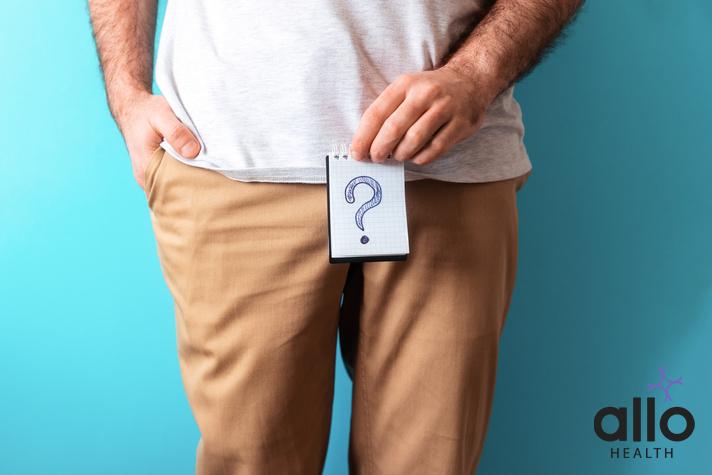 A man in beige jeans holds a notepad with question mark. Close up. Blue background. The concept of artificial insemination and impotence. does masturbation affect muscle gains

Does Urimax D Cause Impotence?