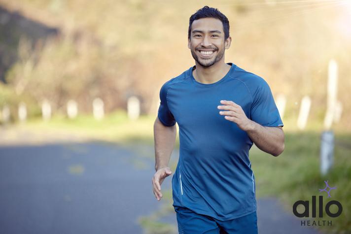 Man, smile in portrait and run outdoor, fitness and cardio with marathon, sports and athlete in nature. Asian male runner in road, happy with running exercise and training for race with mockup space. Masturbation for C-PTSD. ling ko jyada der tak khada kaise rakhe